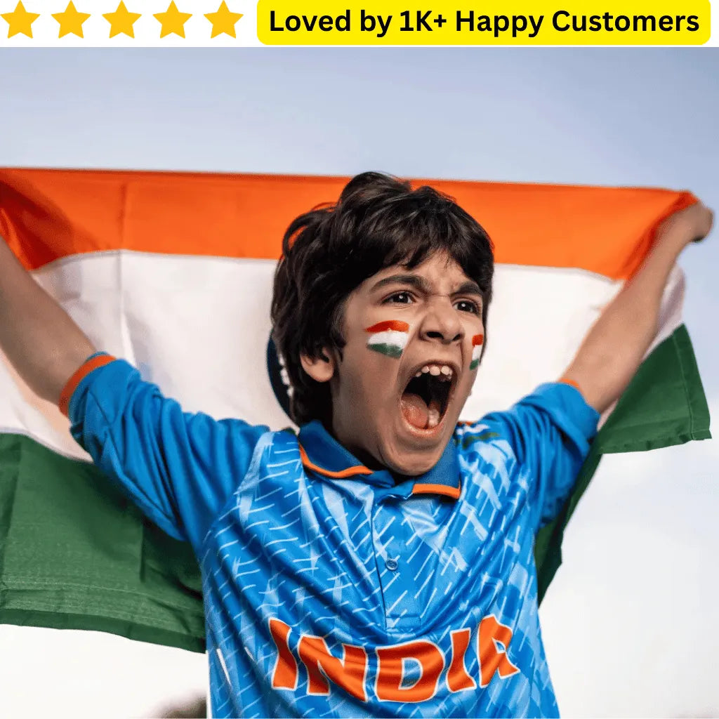 Child holding an Indian flag with 'INDIA' written on a blue shirt, against a clear sky. Custom Temporary Tattoos for Kids South Africa