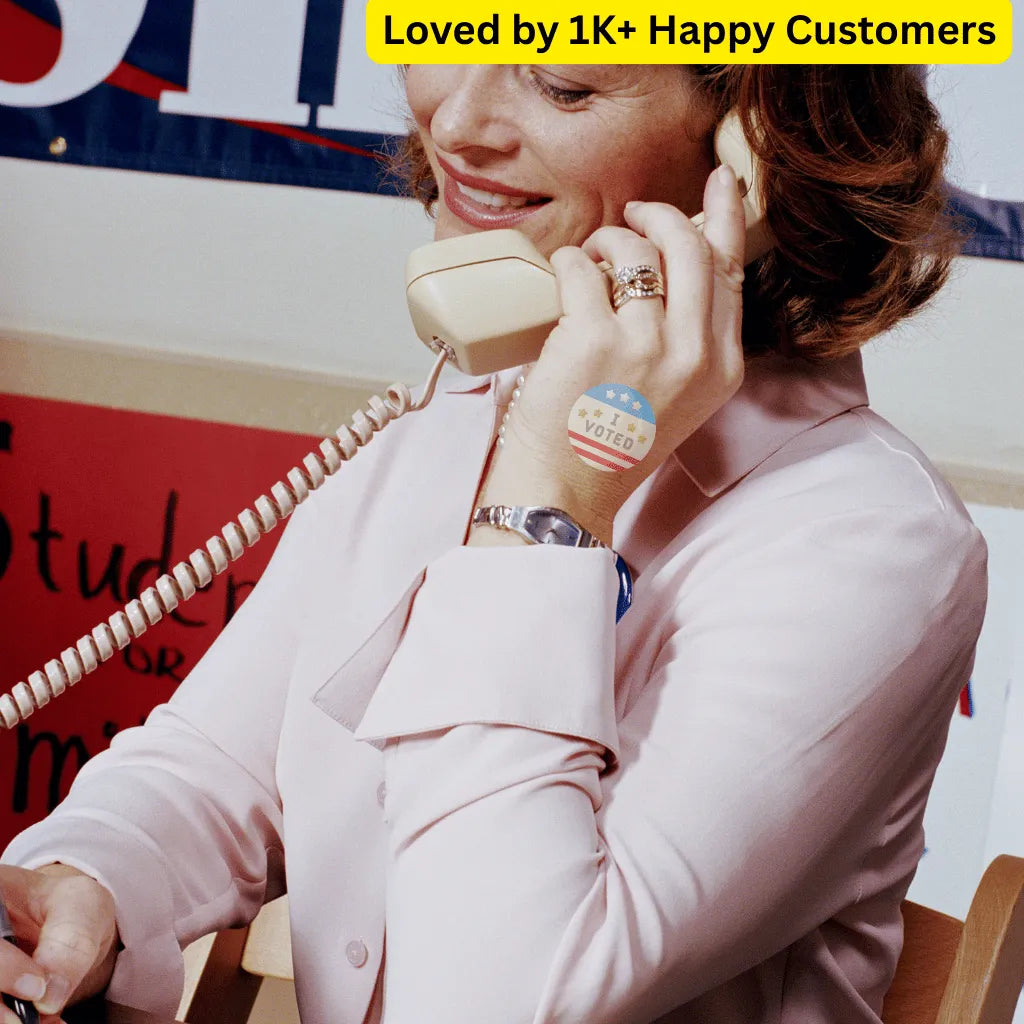 Woman on a phone call with text 'Loved by 1K+ Happy Customers' above her. Personalized tattoos Temporary That Turn Political Support Into Style