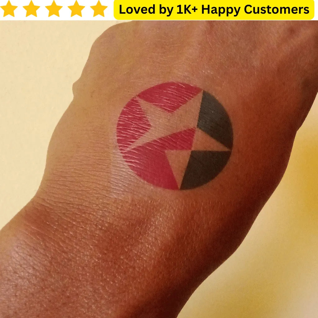 Tattoo of a circular design on a wrist with a yellow banner at the top Custom Tattoo – Your Design, Your Statement 🎨