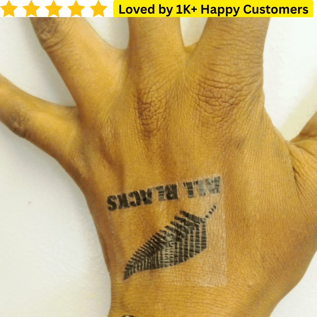Brown leather glove with 'MIL RACKS' branding on a white background, Temporary Tattoo Printing – Fast, Affordable & Local