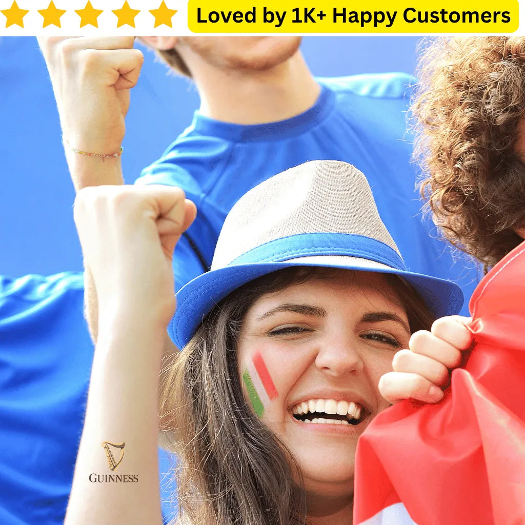 Woman with Italian flag paint on face, wearing a blue hat, surrounded by people with raised fists, with GUINNESS logo. Springboks Tattoo – Rugby & School Team Designs! 🏉