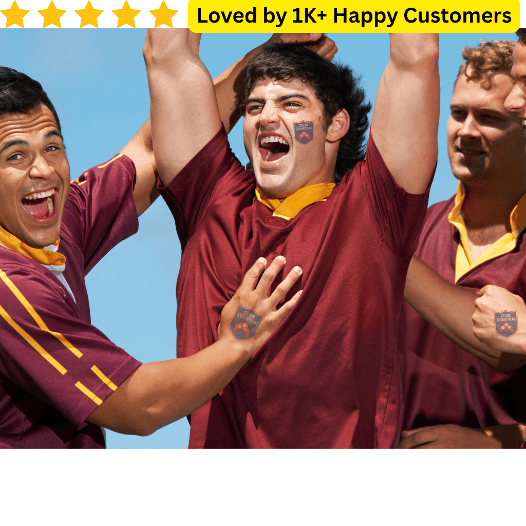 Three men in maroon sports jerseys with yellow accents celebrating against a blue sky. School Temporary Tattoos for Team Spirit