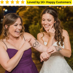 Two women, one in a purple dress and the other in a wedding gown, showing tattoos of interlocking rings. Test your wedding ring design with a temporary tattoo before making it permanent.