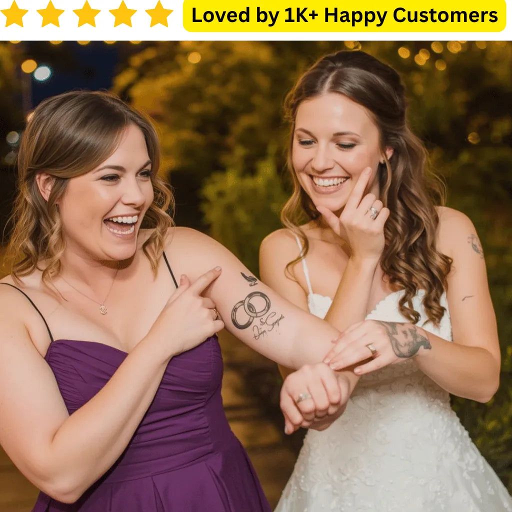 Two women, one in a purple dress and the other in a wedding gown, showing tattoos of interlocking rings. Test your wedding ring design with a temporary tattoo before making it permanent.