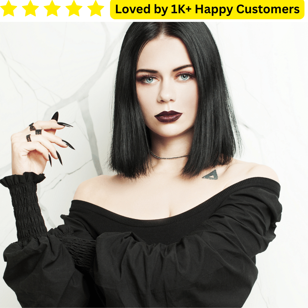 Woman with black hair and makeup, wearing a black off-shoulder top, with text 'Loved by 1K+ Happy Customers' above. Order Custom Temporary Tattoos for Adults, on-Permanent Styles &amp; Long Lasting Ink