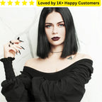 Woman with black hair and makeup, wearing a black off-shoulder top, with text 'Loved by 1K+ Happy Customers' above. Goth Tattoo – Upload Your Artwork & Get in 3 Days
