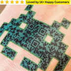 Green electronic patch with QR code design on skin, loved by 1K+ happy customers text above. Custom Temporary Tattoos for Kids South Africa