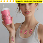 Woman with pink breast cancer awareness tattoos holding a pink cup. Custom Tattoo – Your Design, Your Statement 🎨