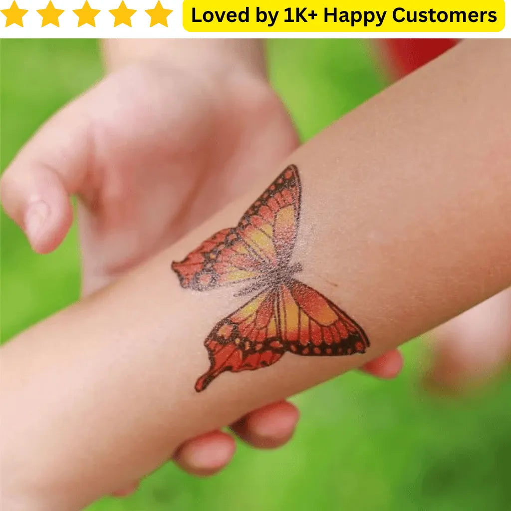Butterfly tattoo on a child's arm with a green background and text about customer satisfaction. Custom Tattoo – Your Design, Your Statement 🎨