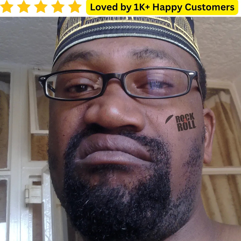 Man wearing glasses with a 'Rock & Roll' tattoo on his neck, set against a neutral background. Fake Rock Star Tattoos