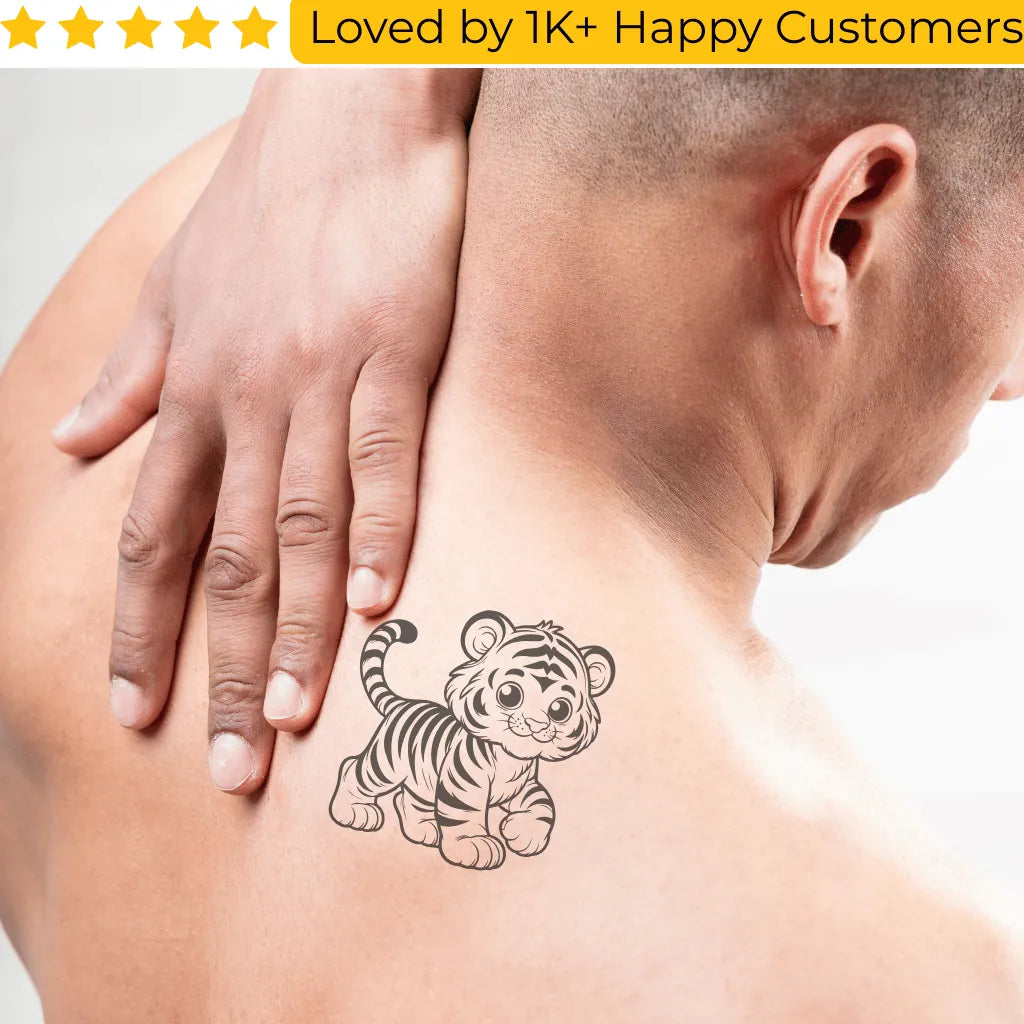 Person with a cute tiger tattoo on their shoulder, surrounded by text about customer satisfaction. Shop Online for Fake Tattoos South Africa’s Best Tattoo Designs
