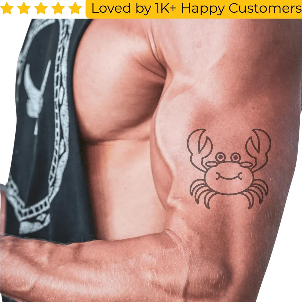 Muscular arm with a crab tattoo and a black tank top worn by a person. Shop Online for Fake Tattoos South Africa’s Best Tattoo Designs