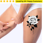 White rose tattoo on a person's leg with a hand touching it, on a white background. Bold, Skin-Safe Tattoos Tattoos for Women Who Love Fashion Without the Commitment