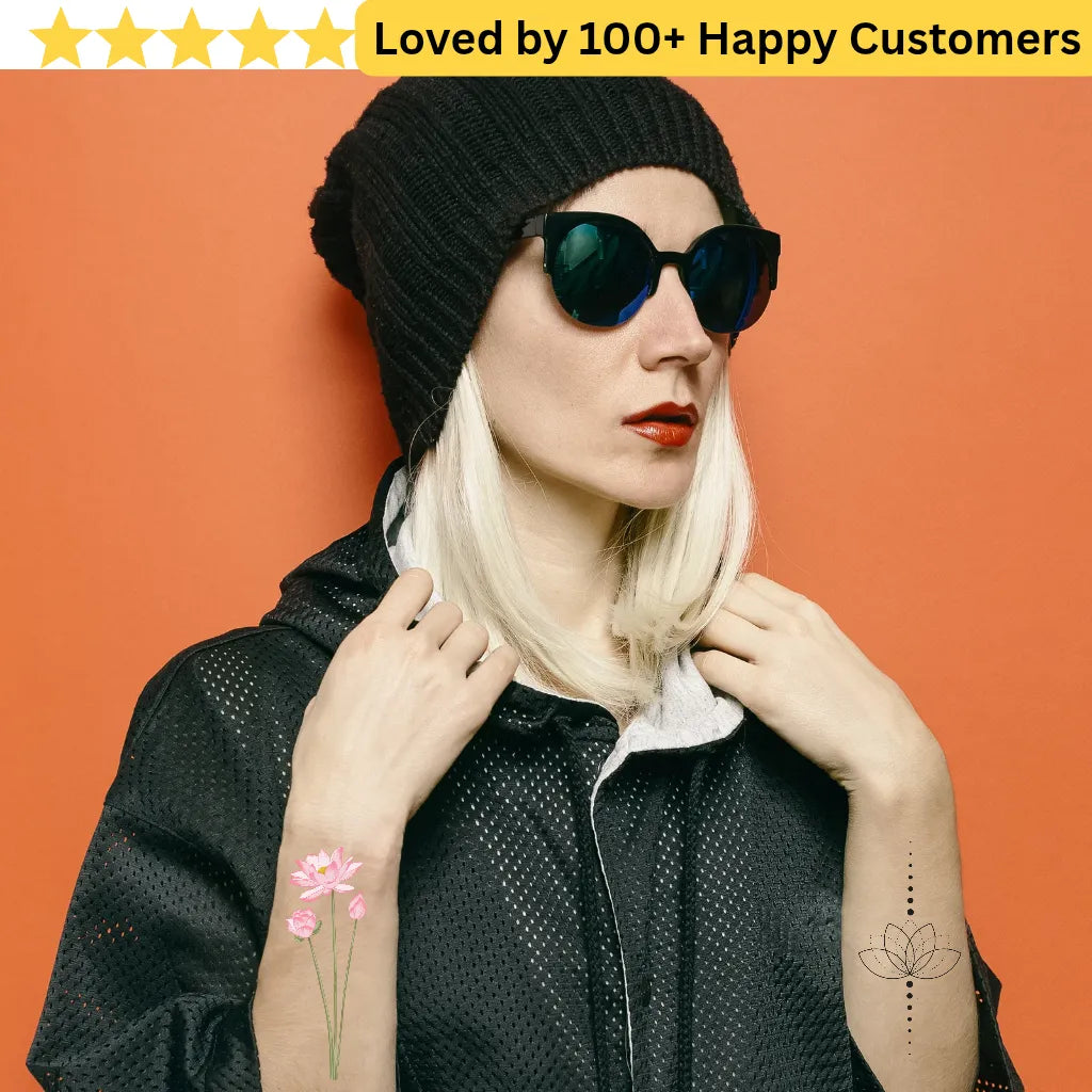 Person wearing a black beanie and sunglasses with a tattoo on an orange background. Elegant Flower Tattoo Lotus for Inner Peace