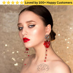 Woman wearing red earrings with a gold background and text 'Loved by 100+ Happy Customers'.Elegant Flower Tattoo Lotus for Inner Peace