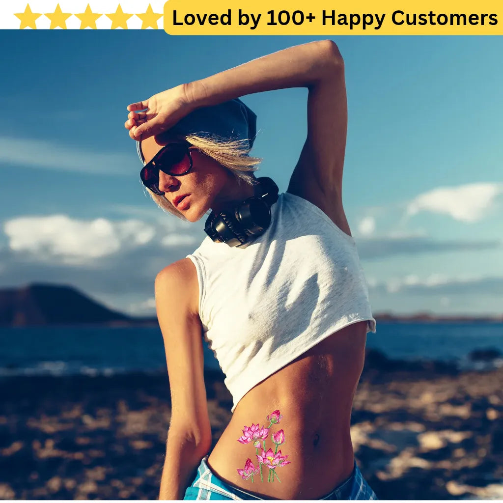 Woman with a floral tattoo on her arm standing outdoors with mountains in the background. Elegant Flower Tattoo Lotus for Inner Peace