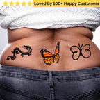Tattoos of a dragon, butterfly, and another butterfly on a person's back with a white towel and denim jeans. Lower Back Tattoos Womens – Feminine & Flirty