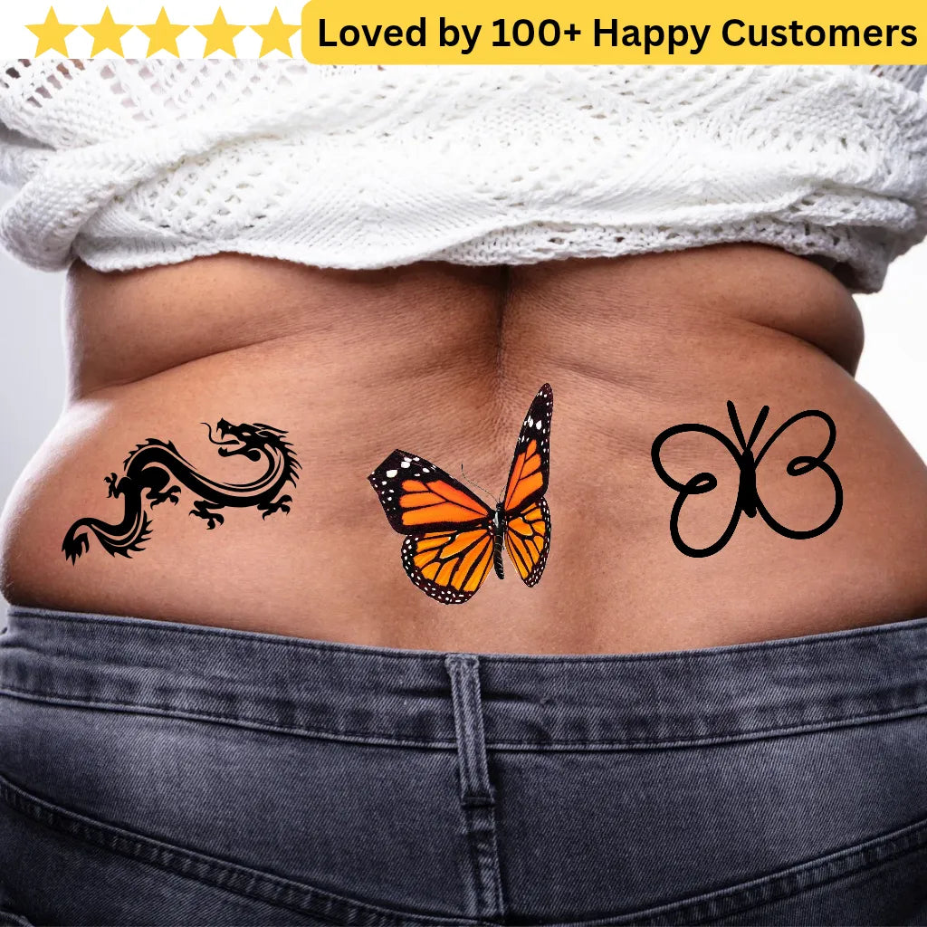 Tattoos of a dragon, butterfly, and another butterfly on a person's back with a white towel and denim jeans. Lower Back Tattoos Womens – Feminine & Flirty