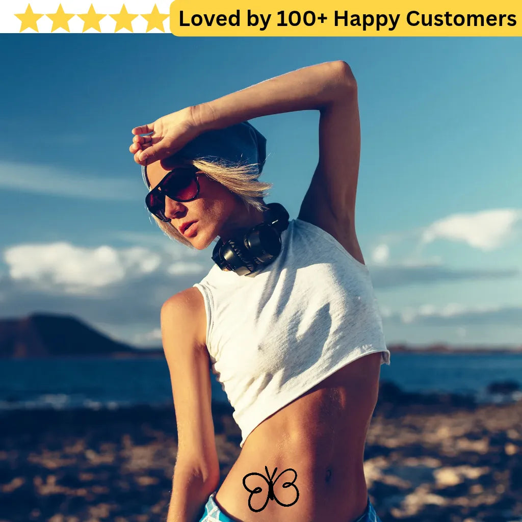 Woman on a beach with sunglasses and a hat, with text 'Loved by 100+ Happy Customers' at the top. Lower Back Tattoos Womens – Feminine & Flirty