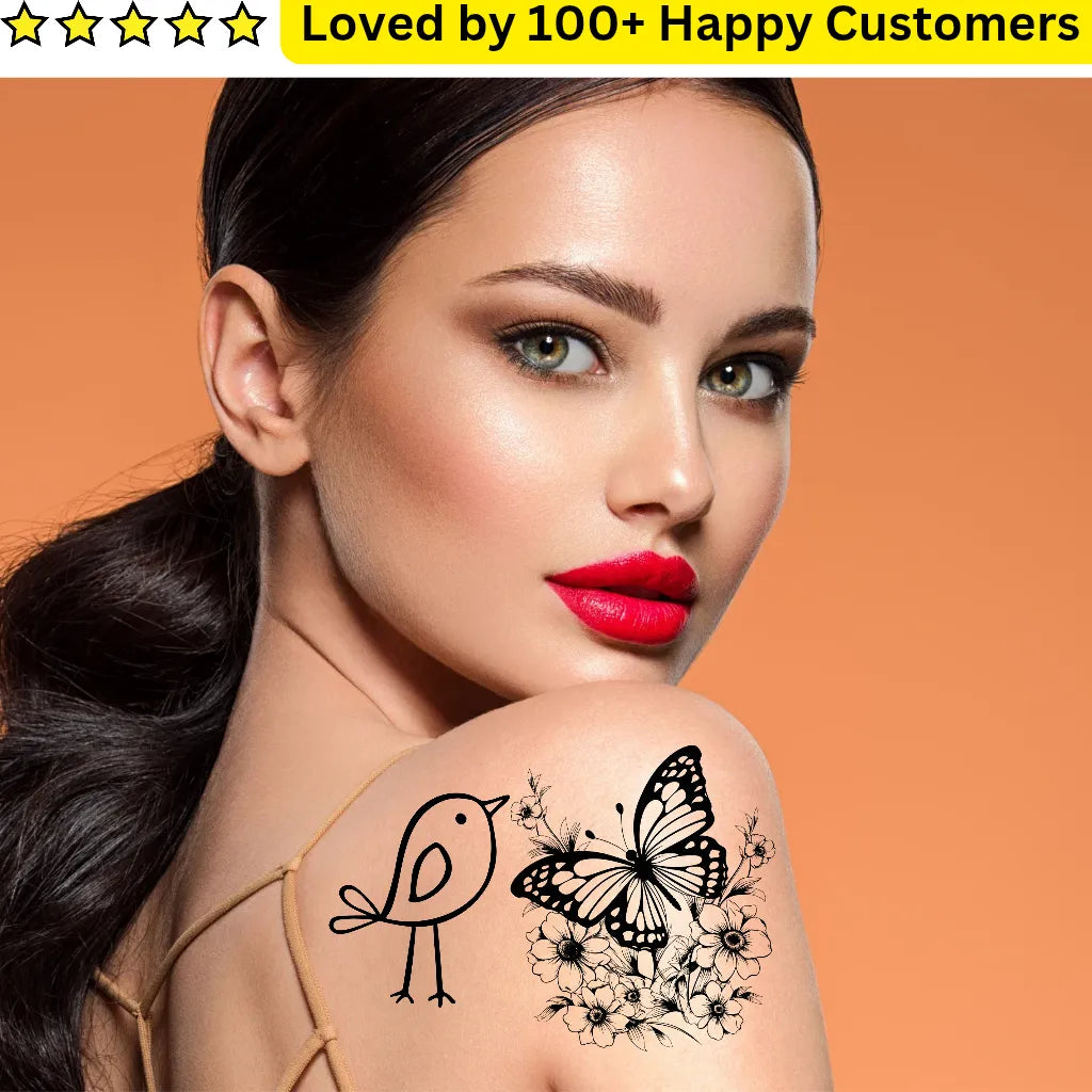 Woman with temporary tattoos of a bird, butterfly, and flowers on her shoulder against an orange background.