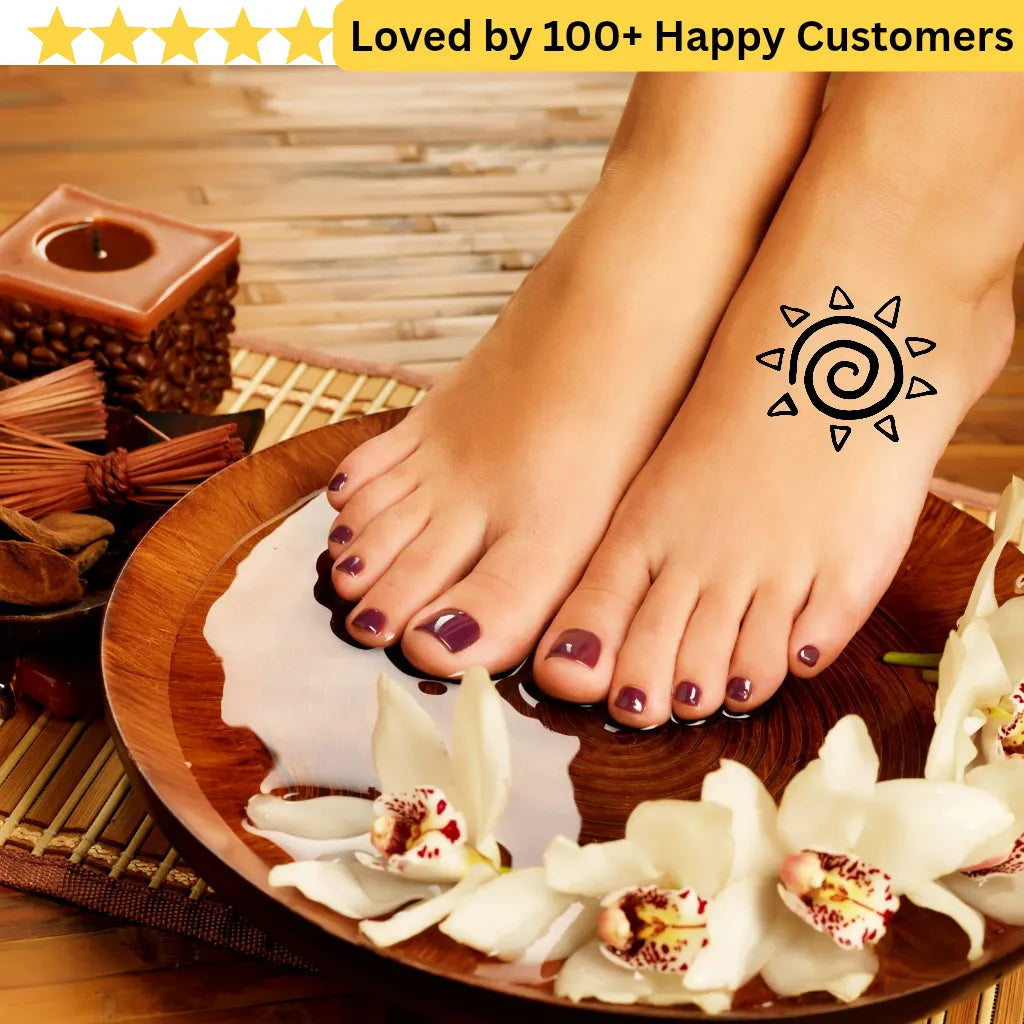 Feet with purple nail polish on a wooden plate with white flowers, surrounded by candles and bamboo. Tribal Tattoo Patterns – Bold & Meaningful Designs