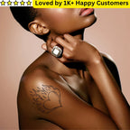 Woman with a tribe tattoo design on her shoulder wearing a ring, with text 'Loved by 1K+ Happy Customers' above.