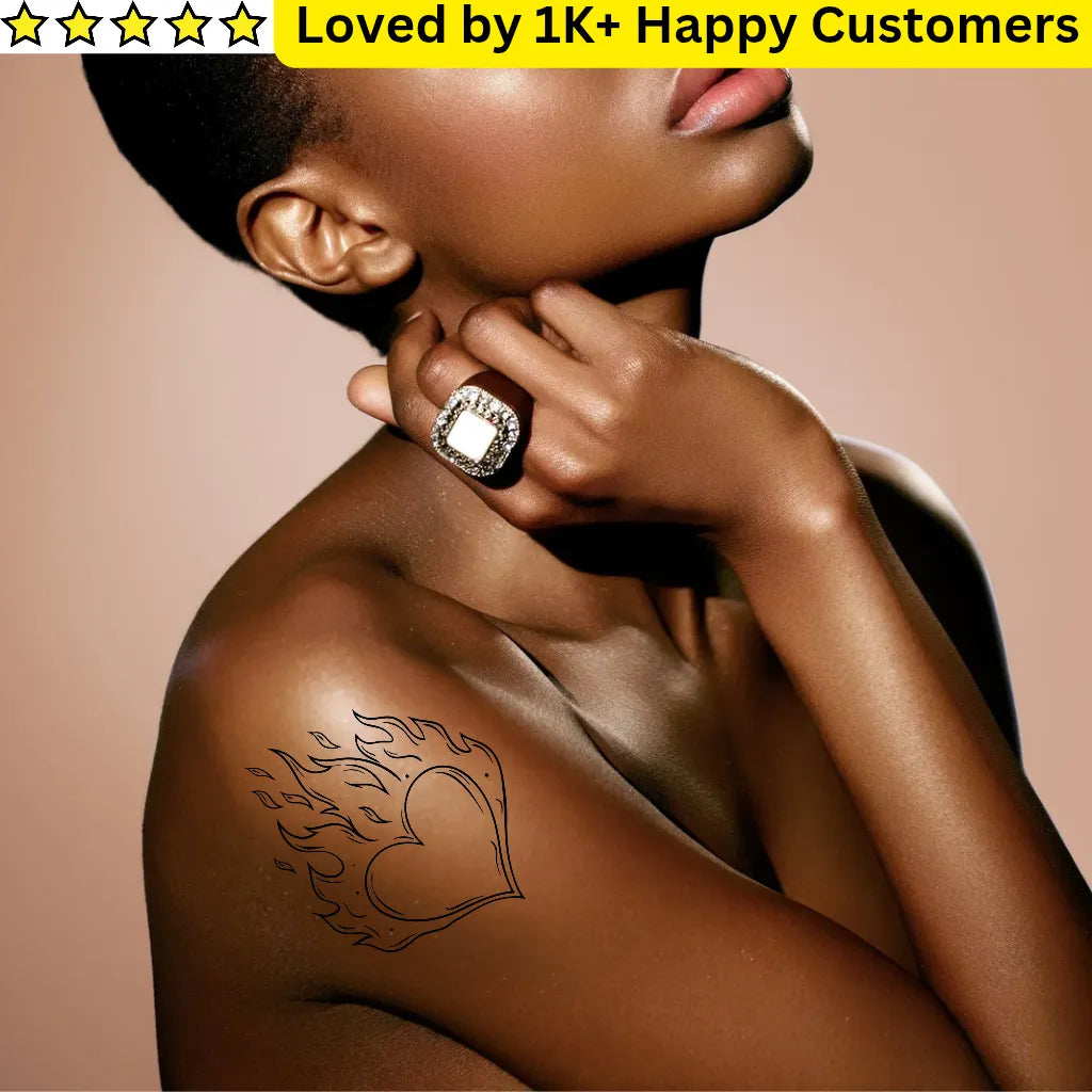 Woman with a tribe tattoo design on her shoulder wearing a ring, with text 'Loved by 1K+ Happy Customers' above.