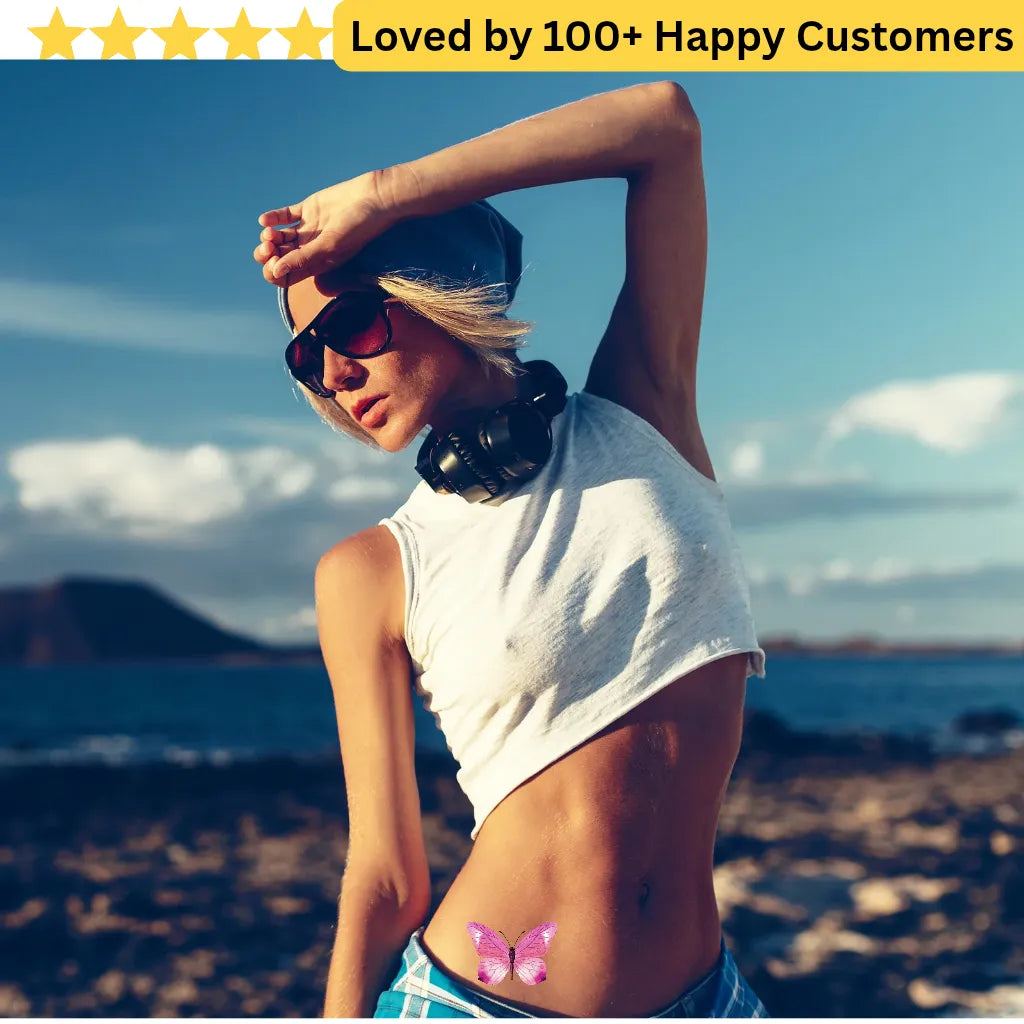 Woman outdoors with headphones and sunglasses, text 'Loved by 100+ Happy Customers' at the top. Women Lower Back Tattoos – Sensual & Temporary Art