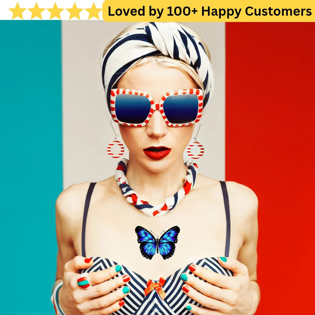 Woman wearing sunglasses and a headscarf with a butterfly design, set against a colorful background. Women Lower Back Tattoos – Sensual & Temporary Art